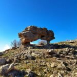 a large rock on a hill